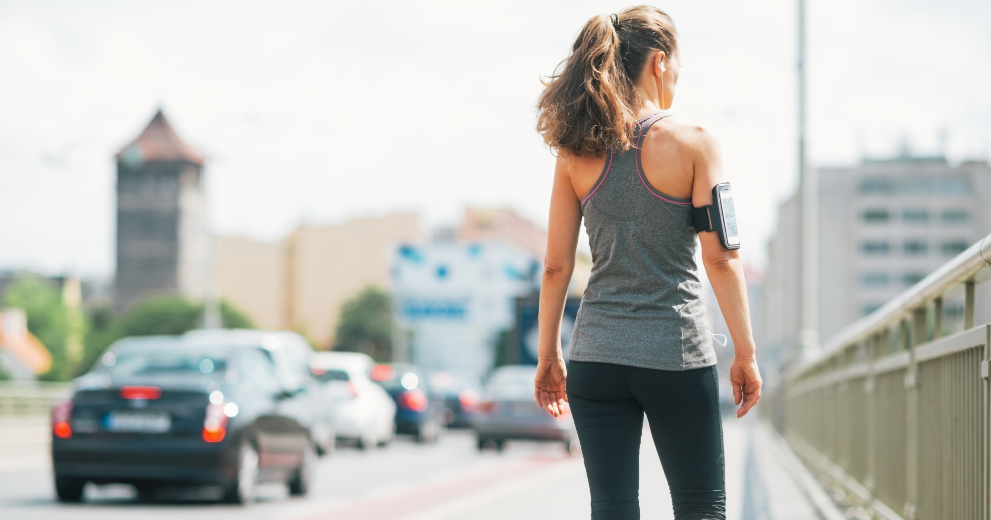 Can walking build muscle? A woman walking in a city
