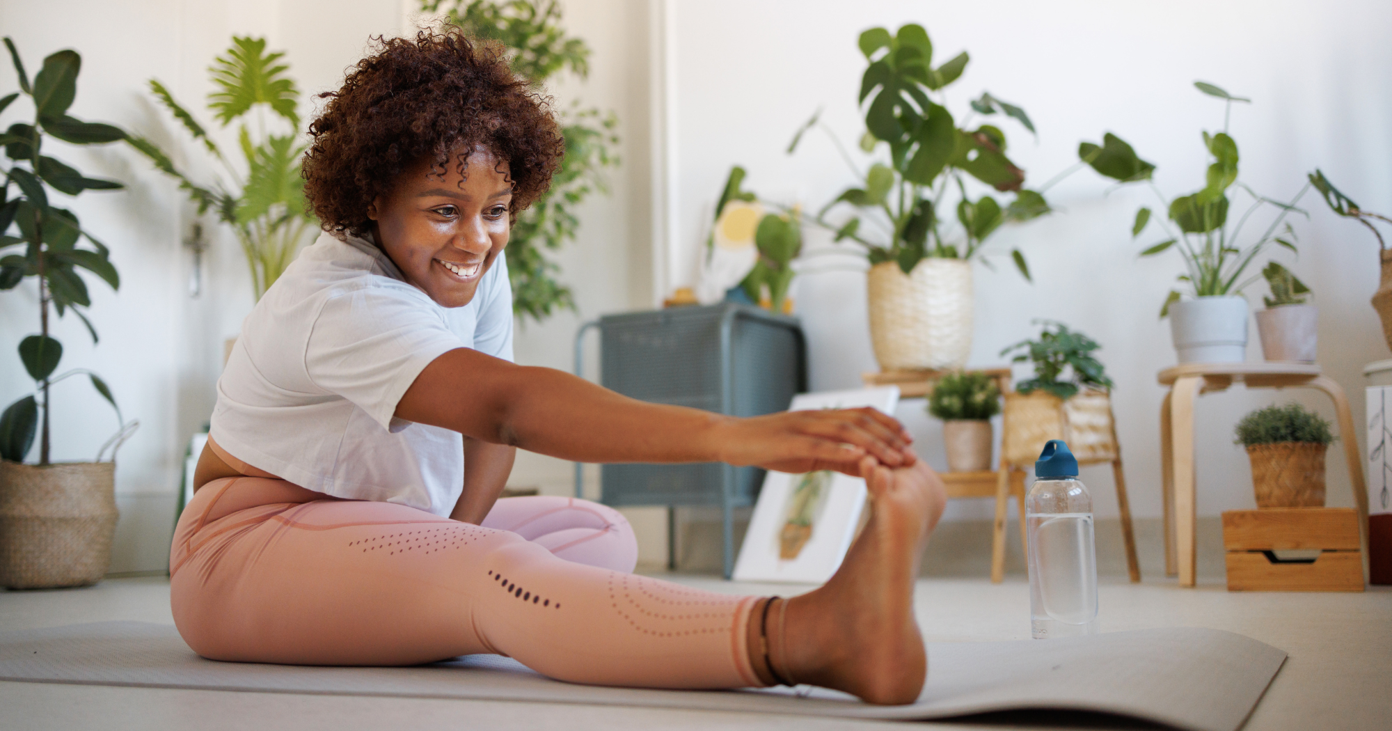 Understanding the Balance Between Fitness and Overtraining- a woman stretching as part of her recovery