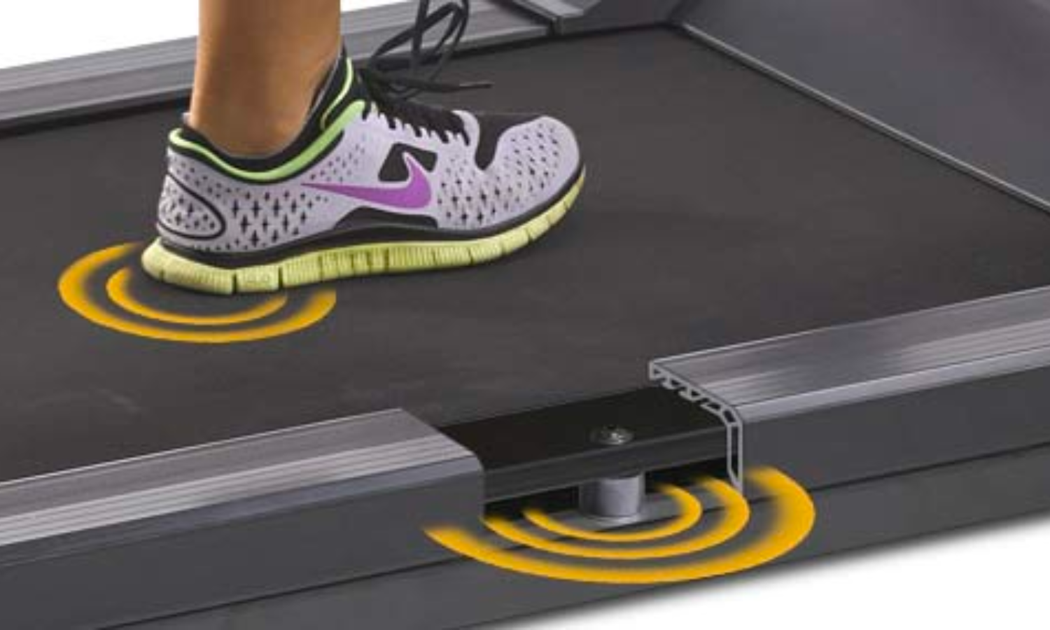 treadmill with large running surface and compression shocks